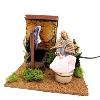 Woman with dripping fountain in motion for nativity scenes