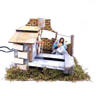 Lavandaia in movimento con fontanile funzionante - statuina cm 10/11