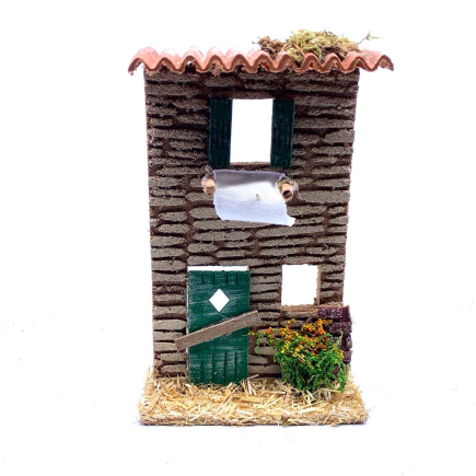 House facade with hanging laundry 11 x 5 x 18 cm