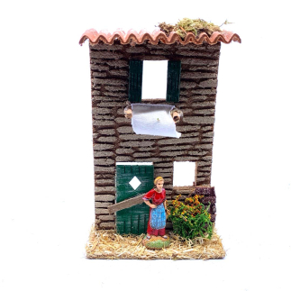 House facade with hanging laundry 11 x 5 x 18 cm