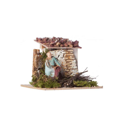 Man pouring wine into vats, moving Landi figurines