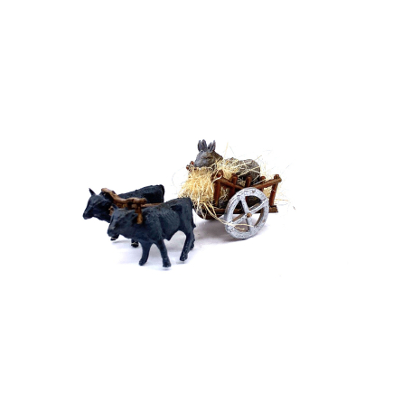 Miniature ox cart with donkeys