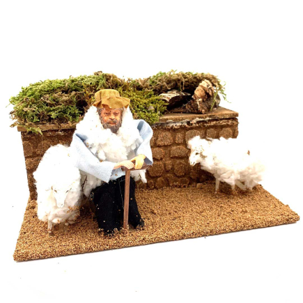 Shepherd with moving sheep
