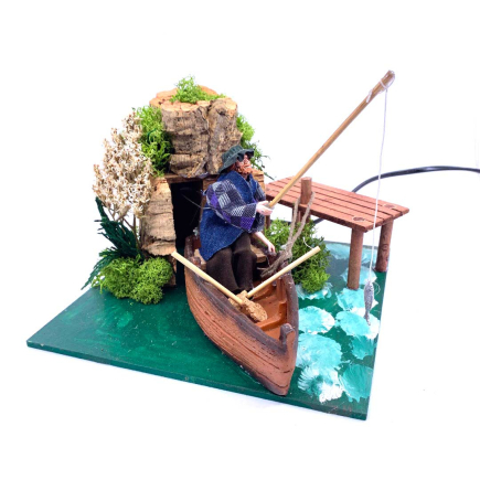 Fisherman with moving boat for nativity scene